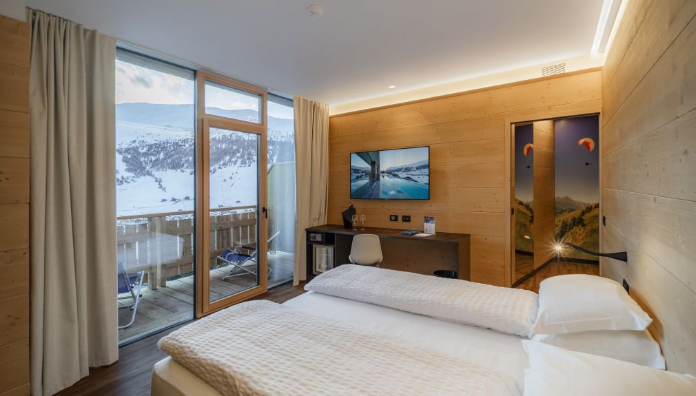 italien, livigno, snowboard reisen, skiurlaub, berlin bus, busreisen, gruppenreisen, skireisen, sporthotel, kinder ski, sportclub, skihütte, preiswert, alpen village, familienreisen